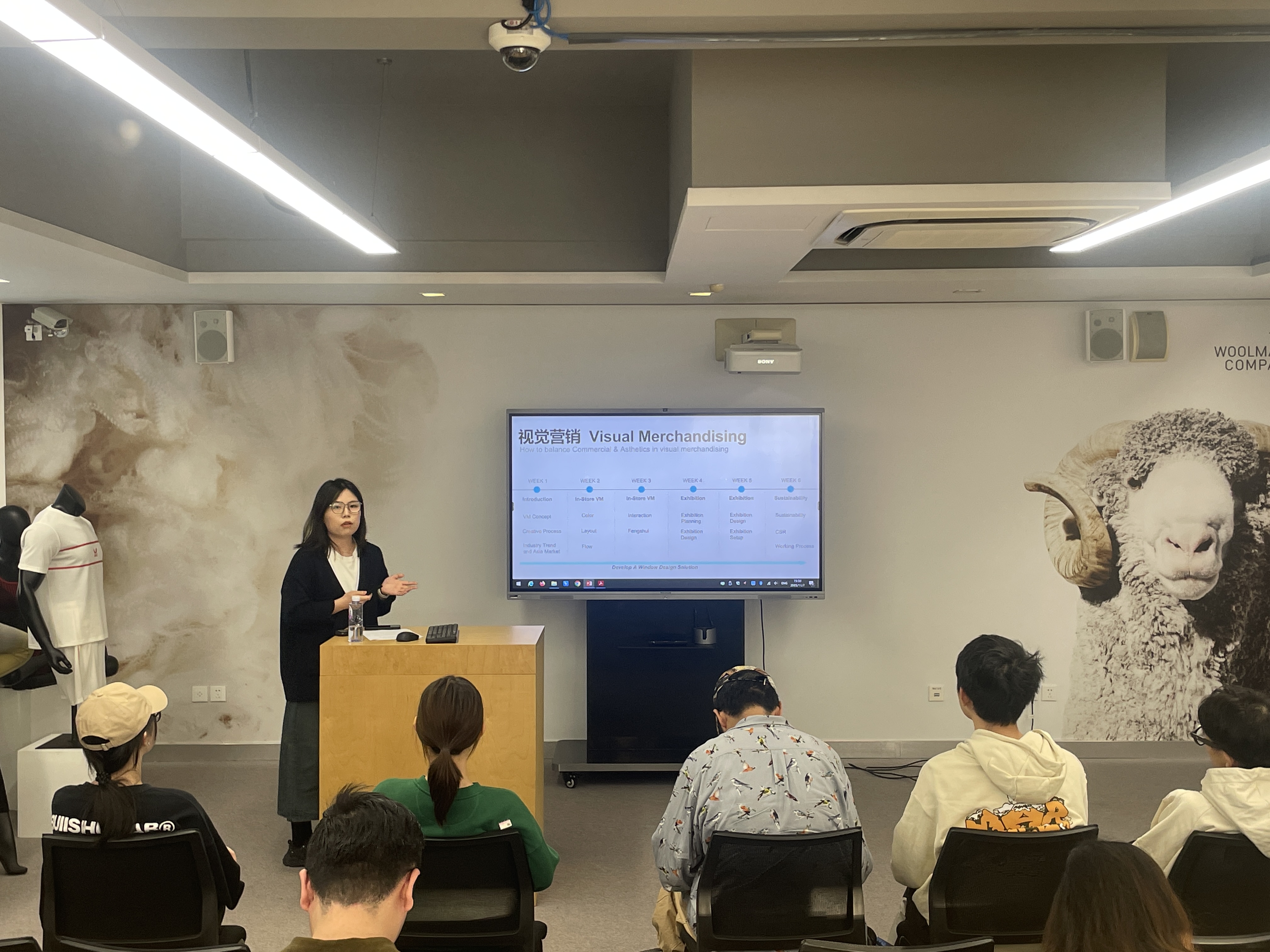 Shaw Qin teaching a visual merchandising class